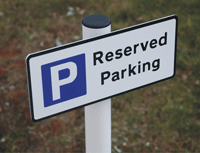 Reserved parking sign on post